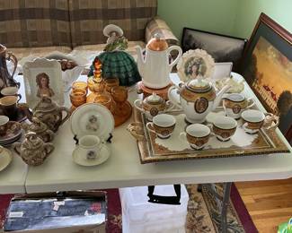 Vintage Porcelain Tea Set with Courting Couple Scenes and Gilded Accents