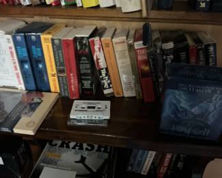 Assorted Paperback Books and Audio Cassettes