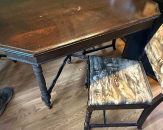 Octagonal Dining Table with Carved Legs and Upholstered Chairs
