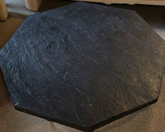 Lot 24: Slate-topped octagonal coffee table with wrought-iron scroll base
