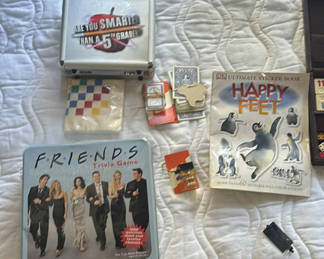 Lot 102: Assorted Board and Trivia Games with Sticker Book