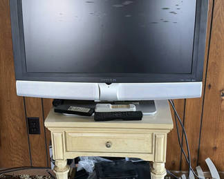Lot 14: Envision TV with VCR/DVD players and portable CD player