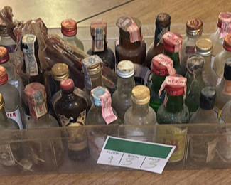 Lot 133: Assorted vintage liquor bottles collection