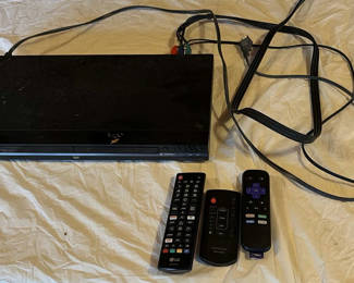 Lot 21: Sony DVD player with remotes and mixed DVD collection
