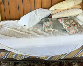 Lot 13: Brass daybed frame with mattress and pillows