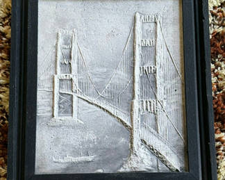 Lot 7: Framed plaster relief of a suspension bridge