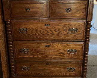 Lot 35: Oak dresser with multiple drawers and ornate hardware