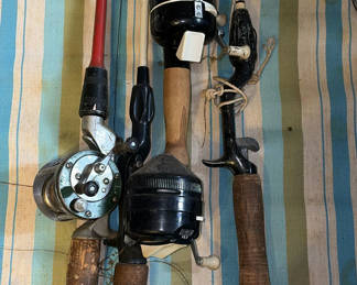 Lot 65: Assorted fishing rods and reels