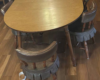 Lot 132: Brown circular table with 6 chairs