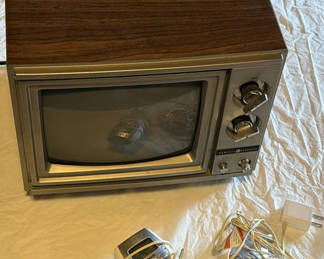Lot 210: Vintage General Electric color television and wired monitor accessories