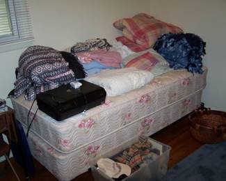ONE OF THE TWIN BEDS & BEDDING