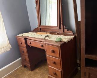 vanity with drawers and mirror