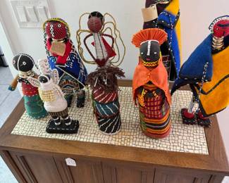 Collection of African beaded, embroidered figures