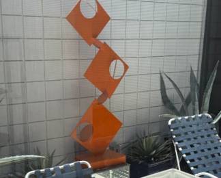 Modern metal sculpture and stand