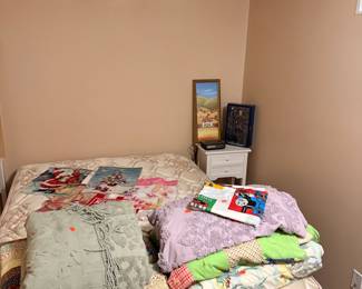 Assorted Bedding, Decorative Pillows, and Holiday Wall Hangings