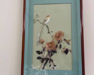 Asian silk paining features a bird on a branch with flowers