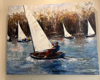 Sail botas on open water