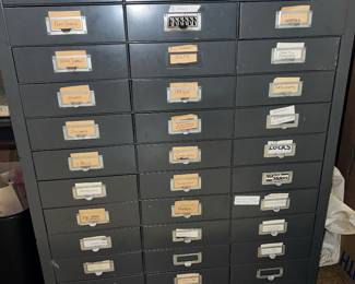 Vintage industrial multi-drawer metal cabinet