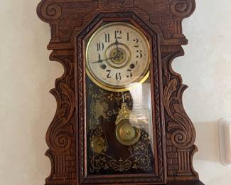 Antique ogee-style parlor wall clock