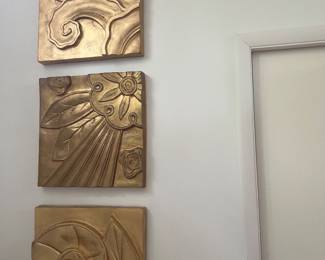 Gold-finished carved wood wall panels 