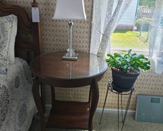 24" round solid wood table with unique square shelf, glass lamp