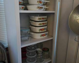Corning ware sets, Rubbermaid, Tupperware, and various storage containers