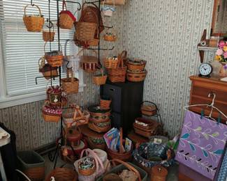 Extensive Longaberger collection, wrought iron hanging and floorstands