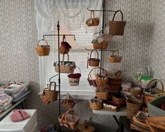 Extensive Longaberger basket collection featuring vintage, signed, and limited-edition pieces with liners and protectors and, where appropriate, lids