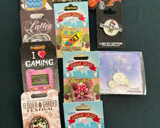 Consigned Disney pins and posters. 