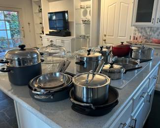 Packed kitchen- Cuisinart pots and pans. 