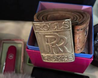 Many belts with fun buckles