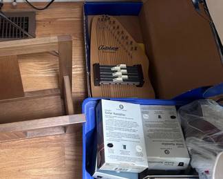Harpsichord and extra guitar strings and tuning pieces 