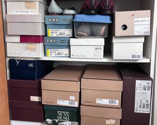 Many many shoes including Coach and Burberry