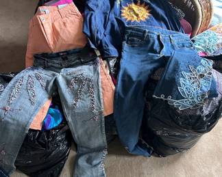 Lots of fun clothes many still with tags on