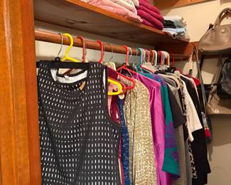 Primary closet of clothes name brands 