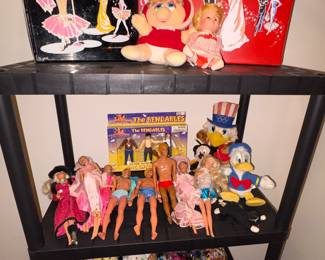Barbie dolls and vintage cases