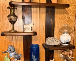 Cute wall shelf with figurines and collectibles 