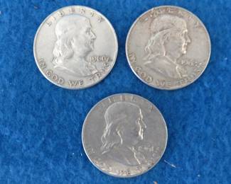 Lot 166. Three Franklin half dollars