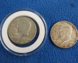 Lot 79. Two silver 1964 Kennedy half dollars