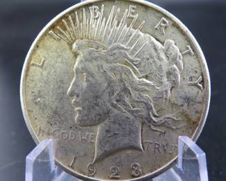 Lot 246. 1923 S Peace dollar