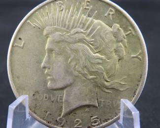 Lot 13. 1925 P Peace silver dollar