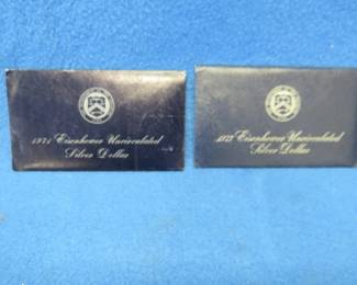 Lot 200. Two 40% silver Eisenhower uncirculated dollar coins
