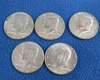 Lot 70. Five 40% silver Kennedy half dollars