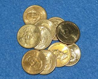 Lot 282. 10 Presidential gold-colored dollar coins