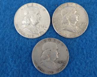 Lot 161. Three Franklin half dollars