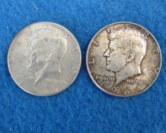 Lot 214. One 90% silver and one 40% silver Kennedy half dollars