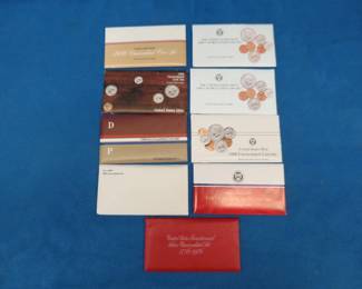 Lot 207. 1976 Bicentennial Silver Uncirculated Set and eight uncirculated sets with dates as pictured.