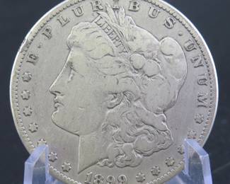 Lot 229. 1899 O Morgan silver dollar