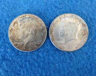 Lot 213. Two 1964 90% silver Kennedy half dollars