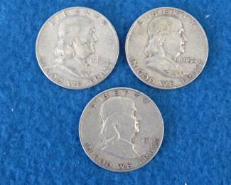 Lot 277. Three Franklin half dollars